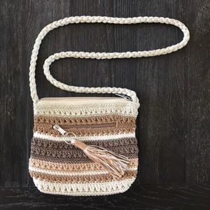 YKK crocheted purse.  Beige toned colors.